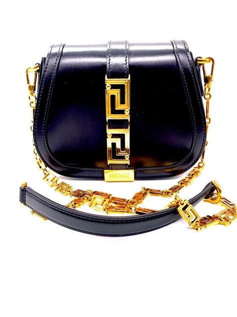 bolso versace con perfume|Colección de bolsos .